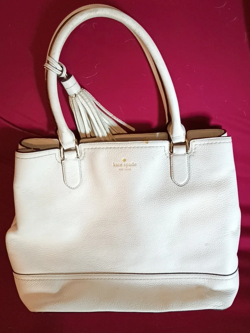kate spade cream pebble leather tote with tassel